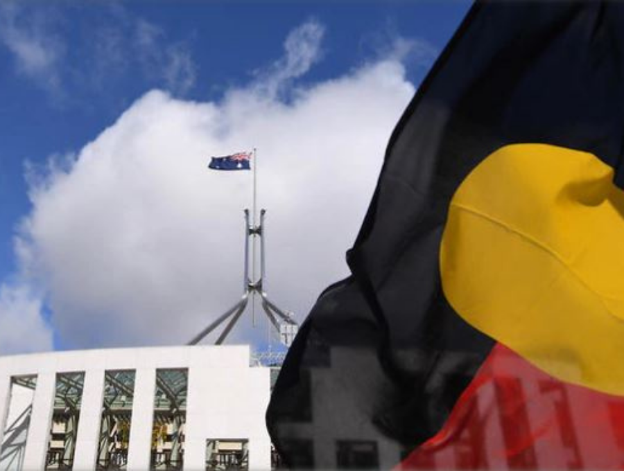 Images of Aboriginal Flag flying with the Australian Parliament house in the background.