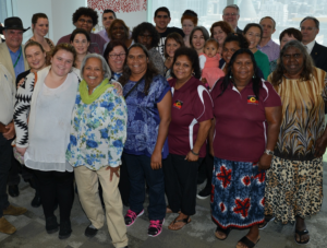 Crowd standing in front of banner at 2014 IGA awards