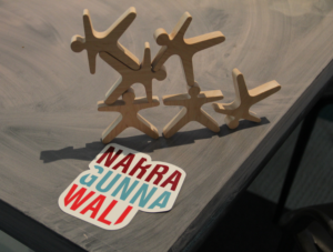 Narragunnawali logo sticker with wooden figurines on table