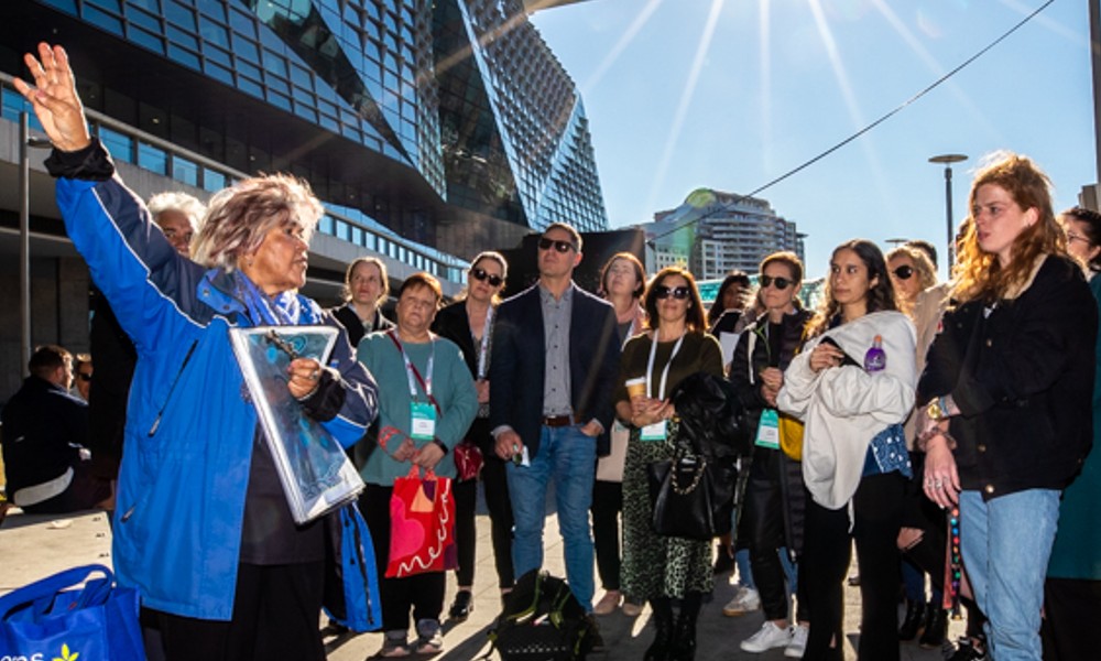 Margaret Campbell giving the cultural tour to RAP Conference attendees along Darling Harbour