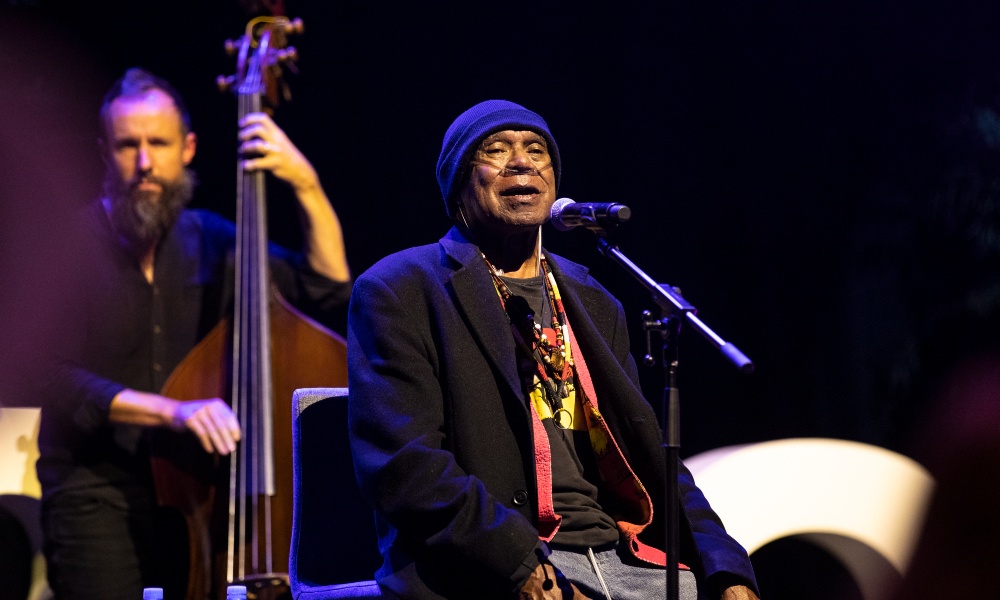 Uncle Archie Roach performing at the 2022 Indigenous Governance Awards, International Convention Centre, Gadigal Country, Photo Joseph Mayers