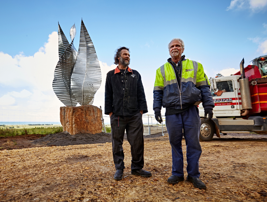 Walter Saunders with the newly installed Mayapa Weeyn sculpture, alongside Jason Scott who collaborated on the construction. Photo: Damian Goodman