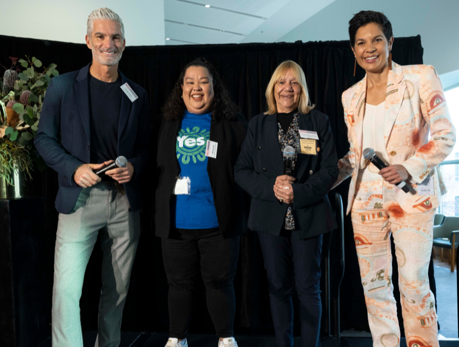 Panellists Craig Foster, Semara Jose and Aunty Geraldine Atkinson along with moderator Narelda Jacobs at the National NRW Breakfast held at Parliament House.