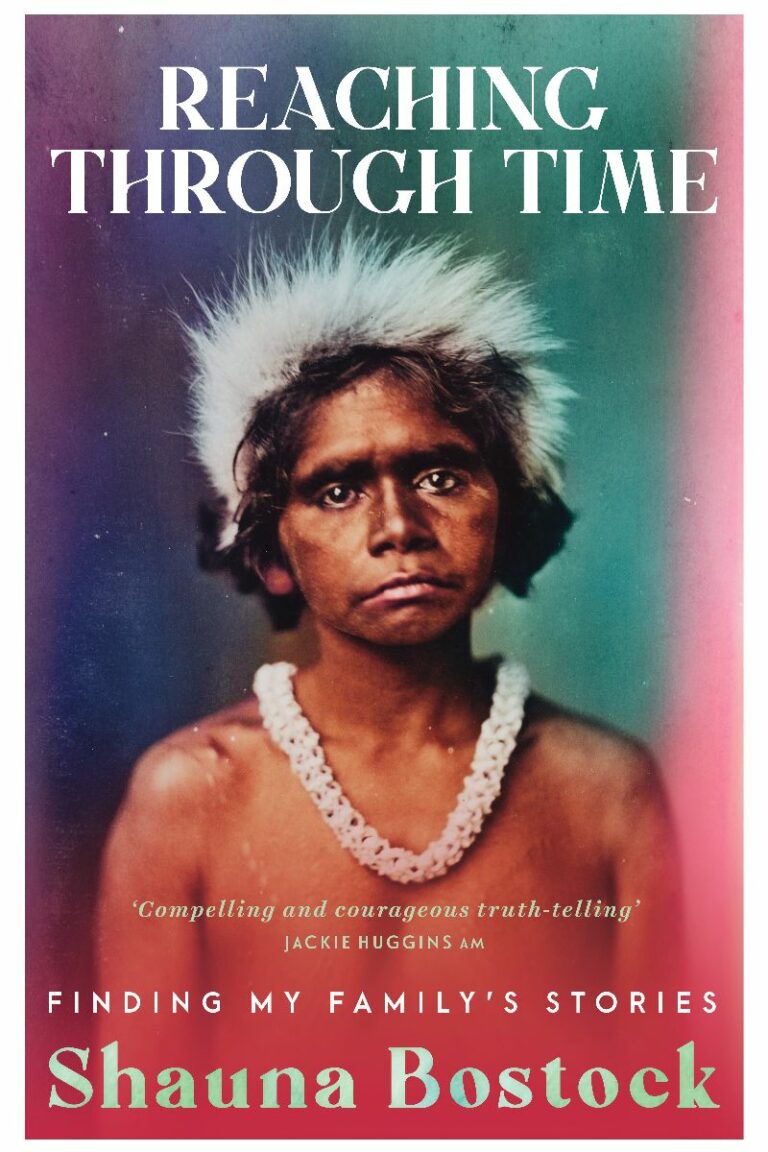 The cover of Reaching Through Time by Shauna Bostock. The image is of an Aboriginal girl wearing an dingo-tail headdress and the vertebrae of a snake for a necklace. She is otherwise unclothed, but the image cuts off just below her shoulders. She is looking straight into the camera, but also beyond it. She is not smiling.