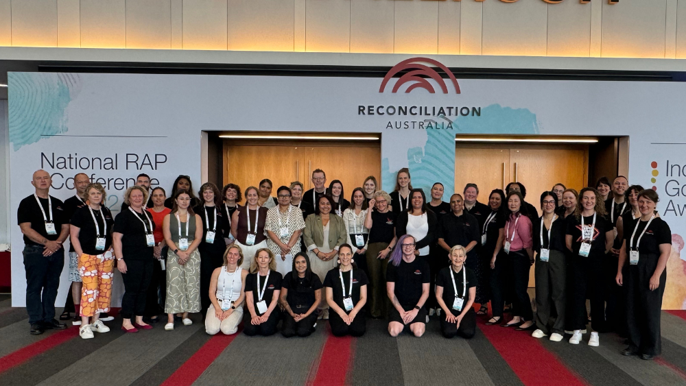 A group photo of Reconciliation Australia staff at the National RAP Conference 2024.