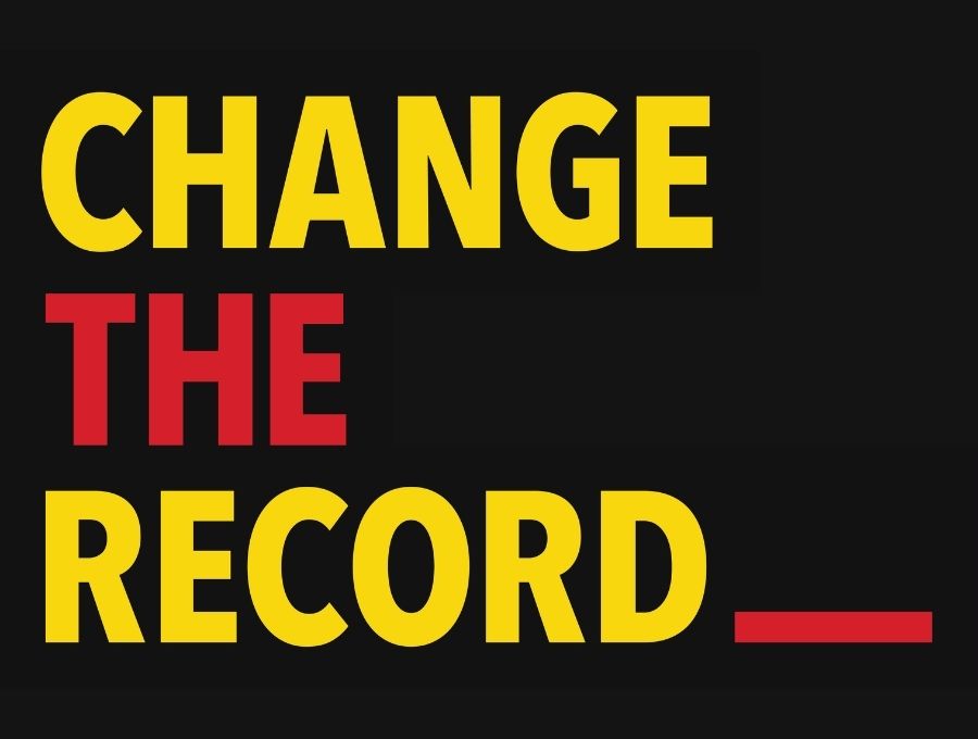 Change the Record campaign graphic - the words 'Change the Record' followed by an underscore, rendered in large, bold red and yellow text on a black background.