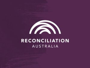 Reconciliation Australia logo on aubergine splash